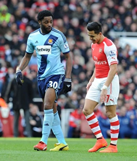 Arsenal V West Ham United 2014/15 Prints: Clash of the Red and White: Sanchez vs. Song - Arsenal vs. West Ham United, Premier League