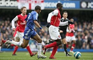 Chelsea v Arsenal 2007-08 Collection: Clash of Rivals: Eboue vs. Cole at Stamford Bridge - Chelsea Edge Past Arsenal 2:1 in Premier League