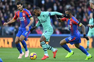 Clash at Selhurst: Lacazette Faces Off Against Tomkins and Ayew