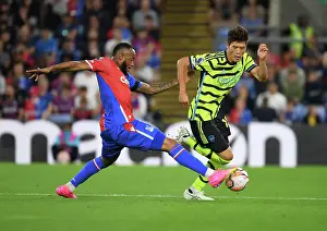 Crystal Palace V Arsenal 2023-24 Prints: Clash at Selhurst Park: Tomiyasu vs Ayew in Premier League Showdown (Crystal Palace v Arsenal 2023-24)