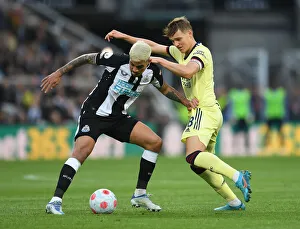 Newcastle United V Arsenal 2021-22 Prints: Clash at St. James Park: Martin Odegaard vs Bruno Guimaraes in Newcastle United vs Arsenal Premier League Encounter