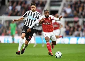 Newcastle United V Arsenal 2018-19 Prints: Clash at St. James Park: A Battle Between Lacazette and Fernandez - Arsenal vs