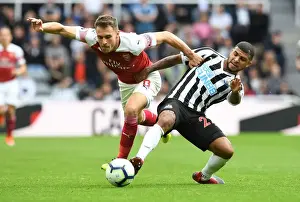 Newcastle United V Arsenal 2018-19 Prints: Clash at St. James Park: A Battle Between Ramsey and Kenedy - Arsenal vs