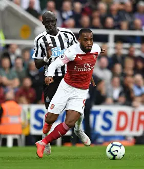 Newcastle United V Arsenal 2018-19 Prints: Clash at St. James Park: Lacazette vs Diame in Premier League Showdown