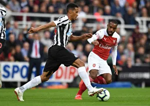 Newcastle United V Arsenal 2018-19 Prints: Clash at St. James Park: Lacazette vs. Hayden