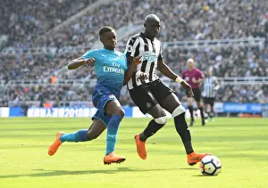 Newcastle United V Arsenal 2017-18 Prints: Clash at St. James Park: Nketiah Chases Down Diame in Premier League Showdown