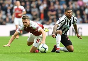 Images Dated 15th September 2018: Clash at St. James Park: Ramsey vs. Kenedy - Arsenal vs. Newcastle United, Premier League 2018/19