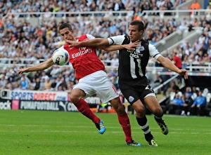 Newcastle United V Arsenal 2011-12 Prints: Clash at St. James Park: Robin van Persie vs. Ryan Taylor