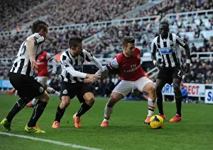 Newcastle United V Arsenal 2013-14 Prints: Clash at St. James Park: Wilshere Faces Off Against Newcastle Trio