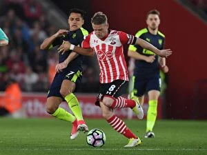 Southampton v Arsenal 2016-17 Collection: Clash at St. Mary's: Alexis Sanchez vs. Steven Davis in Premier League Showdown