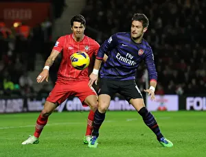 Southampton V Arsenal 2012-13 Prints: Clash at St. Mary's: Giroud vs. Fonte in Southampton v Arsenal, Premier League 2012-13