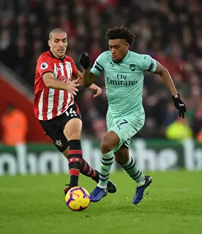 Southampton V Arsenal 2018-19 Prints: Clash at St. Mary's: Iwobi vs. Romeu in Southampton v Arsenal Football Showdown