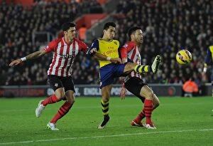 Southampton v Arsenal 2014-15 Collection: Clash at St. Mary's: Sanchez Faces Off Against Southampton Defenders