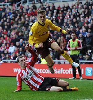 Images Dated 9th February 2013: Clash at the Stadium of Light: Ramsey vs Gardner in Sunderland v Arsenal, Premier League 2012-13