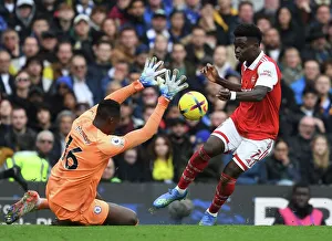 Clash at Stamford Bridge: Arsenal's Bukayo Saka vs. Chelsea's Edouard Mendy