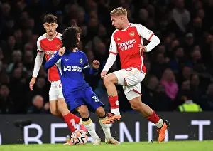 Clash at Stamford Bridge: Arsenal's Emile Smith Rowe Faces Off Against Chelsea's Marc Cucurella (2023-24)