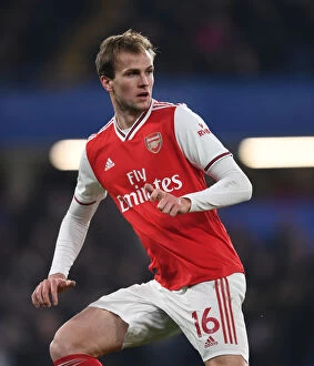 Chelsea v Arsenal 2019-20 Collection: Clash at Stamford Bridge: Arsenal's Rob Holding Faces Off Against Chelsea