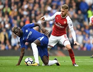 Images Dated 17th September 2017: Clash at Stamford Bridge: Ramsey vs. Bakayoko