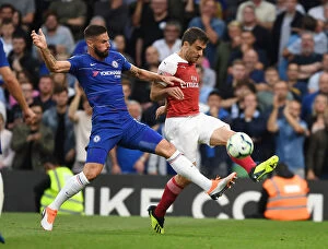 Chelsea v Arsenal 2018-19 Collection: Clash at Stamford Bridge: Sokratis vs. Giroud - Premier League Showdown