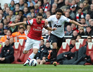 Arsenal V Manchester United 2012-13 Prints: Clash of Stars: Cazorla vs. Rafael in Arsenal vs. Manchester United Showdown