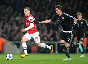Clash of Stars: Jack Wilshere vs. Mario Mandzukic in Intense Arsenal-Bayern Champions League Showdown