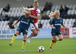 Clash of Stars: Kim Little vs. West Ham Defenders - A Football Battle