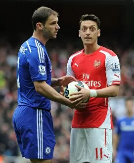 Arsenal v Chelsea 2014/15 Collection: Clash of the Stars: Mesut Ozil vs. Branislav Ivanovic (Arsenal vs. Chelsea, 2015)