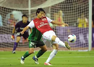 Hangzhou Greentown V Arsenal Prints: Clash of Stars: Miyaichi vs. Liu Bin (Hangzhou Greentown vs. Arsenal)