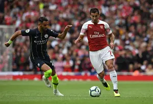 Arsenal V Manchester City 2018-19 Prints: Clash of Stars: Mkhitaryan vs Mahrez - Arsenal vs Manchester City, Premier League 2018-19