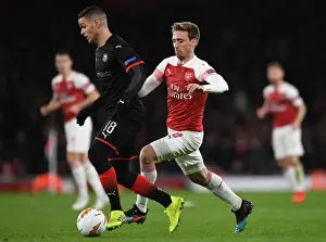 Arsenal V Stade Rennais 2018-19 Prints: Clash of Stars: Monreal vs Ben Arfa in Europa League Showdown (Arsenal v Stade Rennais)