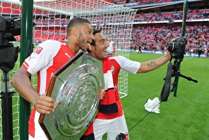 Arsenal V Manchester City - FA Community Shield 2014/15 Prints: Clash of the Stars: Oxlade-Chamberlain vs