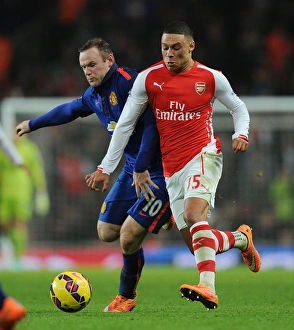 Arsenal V Manchester United 2014-15 Prints: Clash of Stars: Oxlade-Chamberlain vs. Rooney - Arsenal vs. Manchester United (2014-15)