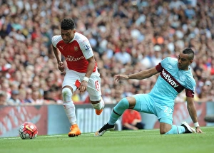Arsenal V West Ham United 2015-16 Prints: Clash of Stars: Oxlade-Chamberlain vs. Payet in Premier League Battle