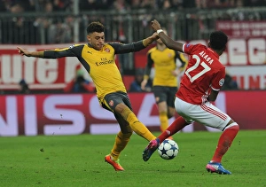 Bayern Munich V Arsenal 2016-17 Prints: Clash of Stars: Oxlade-Chamberlain vs. Alaba - Bayern Munich vs. Arsenal UCL Showdown