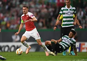 Sporting Lisbon V Arsenal 2018-19 Prints: Clash of Stars: Ramsey vs. Montero in Europa League Showdown