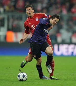 Bayern Munich Collection: Clash of Stars: Rosicky vs. Gomez - The Intense Battle at the Allianz Arena (Bayern Munich vs)