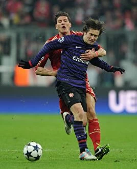 Bayern Munich Collection: Clash of Stars: Rosicky vs. Gomez - Intense Battle at Allianz Arena (Arsenal vs)