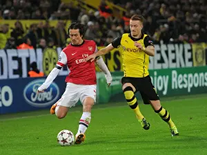 Borussia Dortmund V Arsenal 2013-14 Prints: Clash of Stars: Rosicky vs. Reus - UEFA Champions League Battle