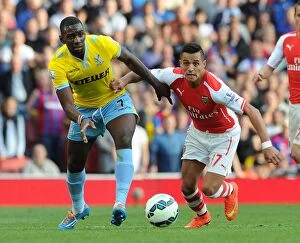 Images Dated 16th August 2014: Clash of Stars: Sanchez vs. Bolasie - Arsenal vs. Crystal Palace, Premier League 2014