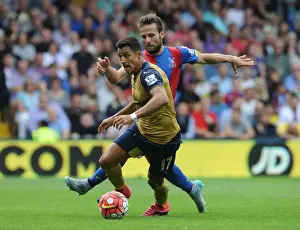 Crystal Palace V Arsenal 2015-16 Prints: Clash of Stars: Sanchez vs Cabaye - Arsenal's Titans Battle in Crystal Palace's Premier League