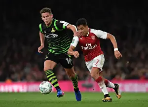 Arsenal V Doncaster Rovers - Carabao Cup 2017-18 Prints: Clash of Stars: Sanchez vs. Houghton in Arsenal's Carabao Cup Battle