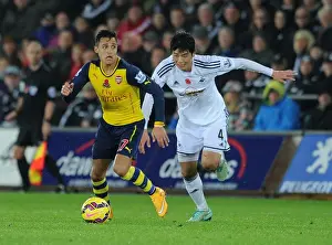 Swansea V Arsenal 2014-15 Prints: Clash of Stars: Sanchez vs. Ki Sunderland Showdown (Swansea v Arsenal, 2014-15)