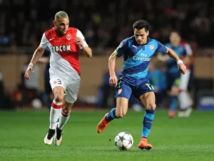 Monaco V Arsenal 2014/15 Prints: Clash of Stars: Sanchez vs. Kurzawa in Monaco-Arsenal UEFA Champions League Showdown