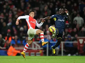 Arsenal V Southampton 2014-15 Prints: Clash of Stars: Sanchez vs Mane in Arsenal's Battle Against Southampton (2014-15)