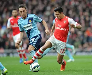 Arsenal V West Ham United 2014/15 Prints: Clash of Stars: Sanchez vs. Noble in Arsenal's Battle against West Ham