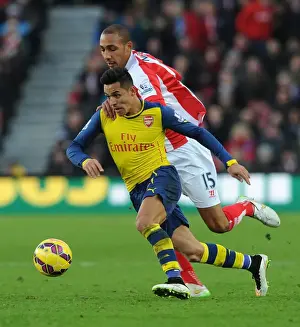 Stoke City V Arsenal 2014-15 Prints: Clash of Stars: Sanchez vs Nzonzi - A Football Battle at Britannia Stadium (2014-15)