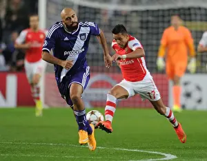 Anderlecht V Arsenal 2014-15 Prints: Clash of Stars: Sanchez vs. Vanden Borre - Arsenal vs. Anderlecht, UEFA Champions League