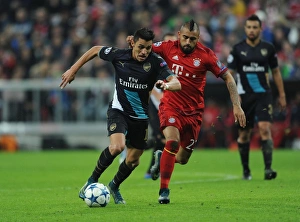 Bayern Munich V Arsenal 2015-16 Prints: Clash of the Stars: Sanchez vs. Vidal - Arsenal vs. Bayern Munich, UEFA Champions League