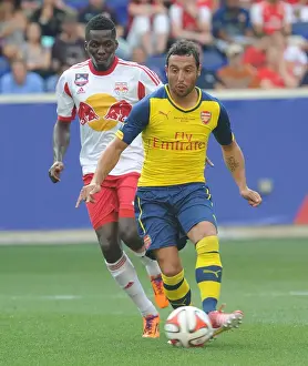 New York Red Bulls V Arsenal 2014-15 Prints: Clash of Stars: Santi Cazorla vs. Ambroise Oyongo - Arsenal vs. New York Red Bulls (2014)