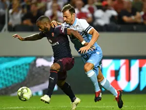 Arsenal V SS Lazio 2018-19 Prints: Clash in Stockholm: Alex Lacazette vs Stefan Radu - Arsenal vs SS Lazio Pre-Season Friendly